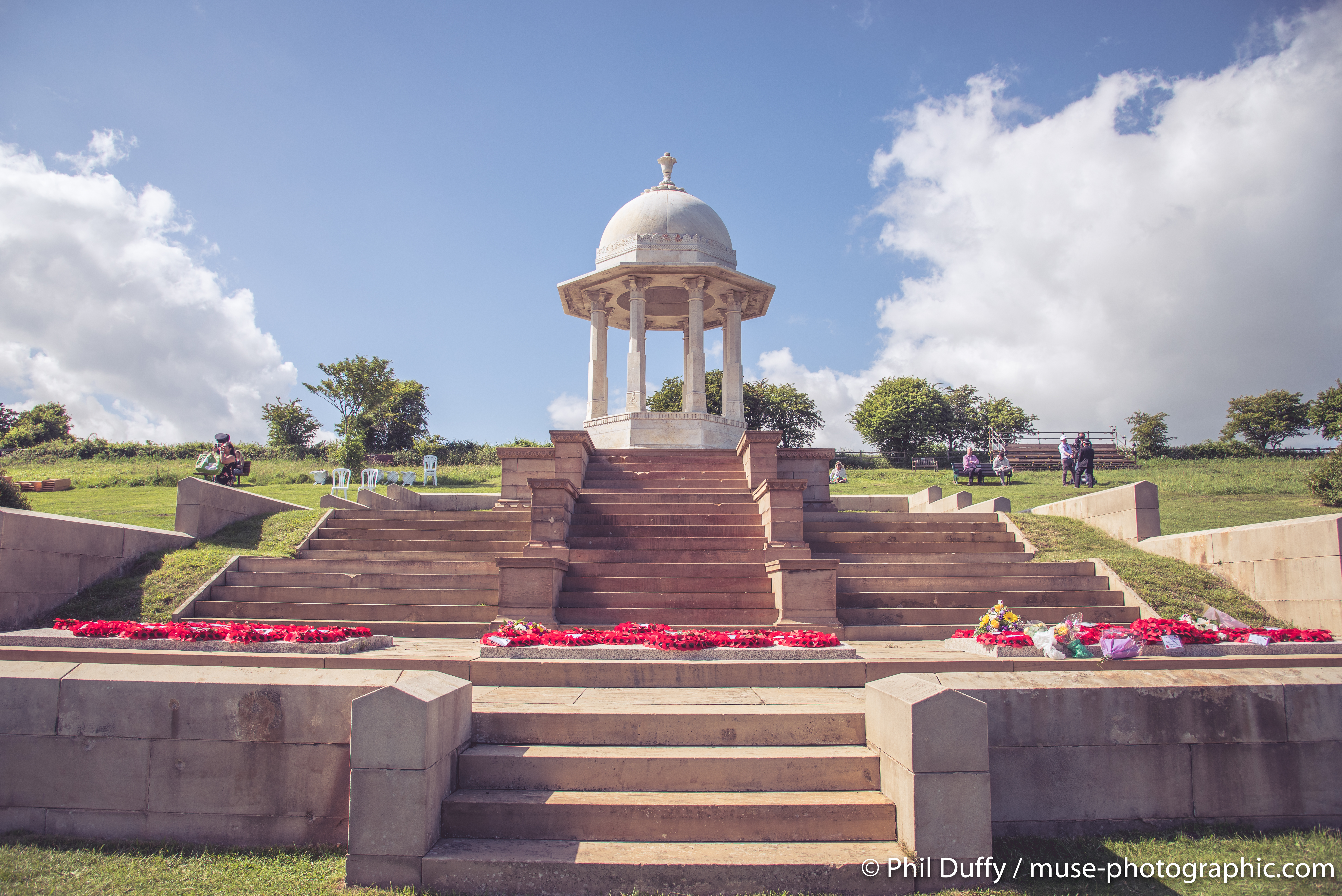 Memorial with poppy wreaths.